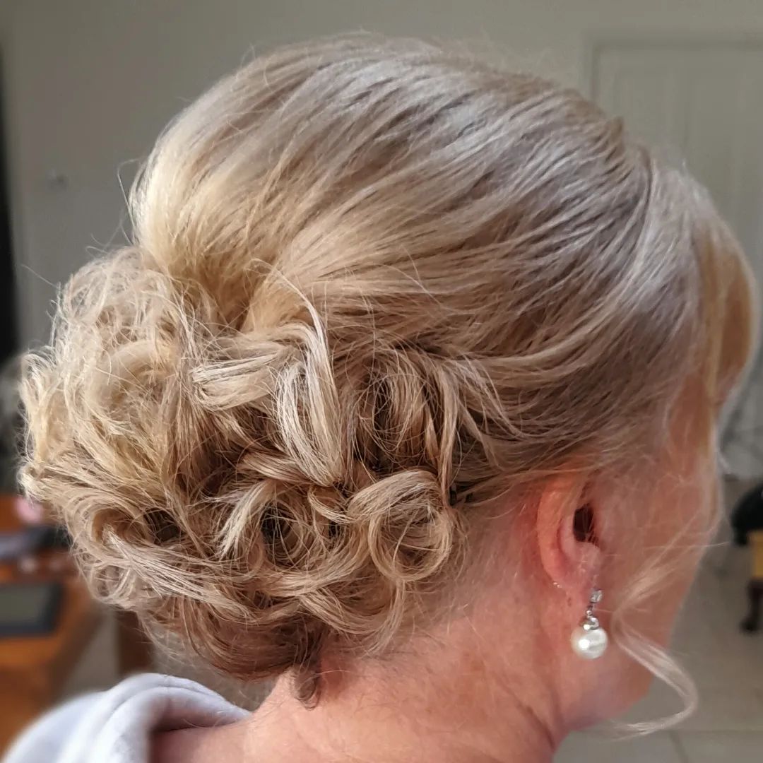 Bouffant Updo with Curly Nape Bun