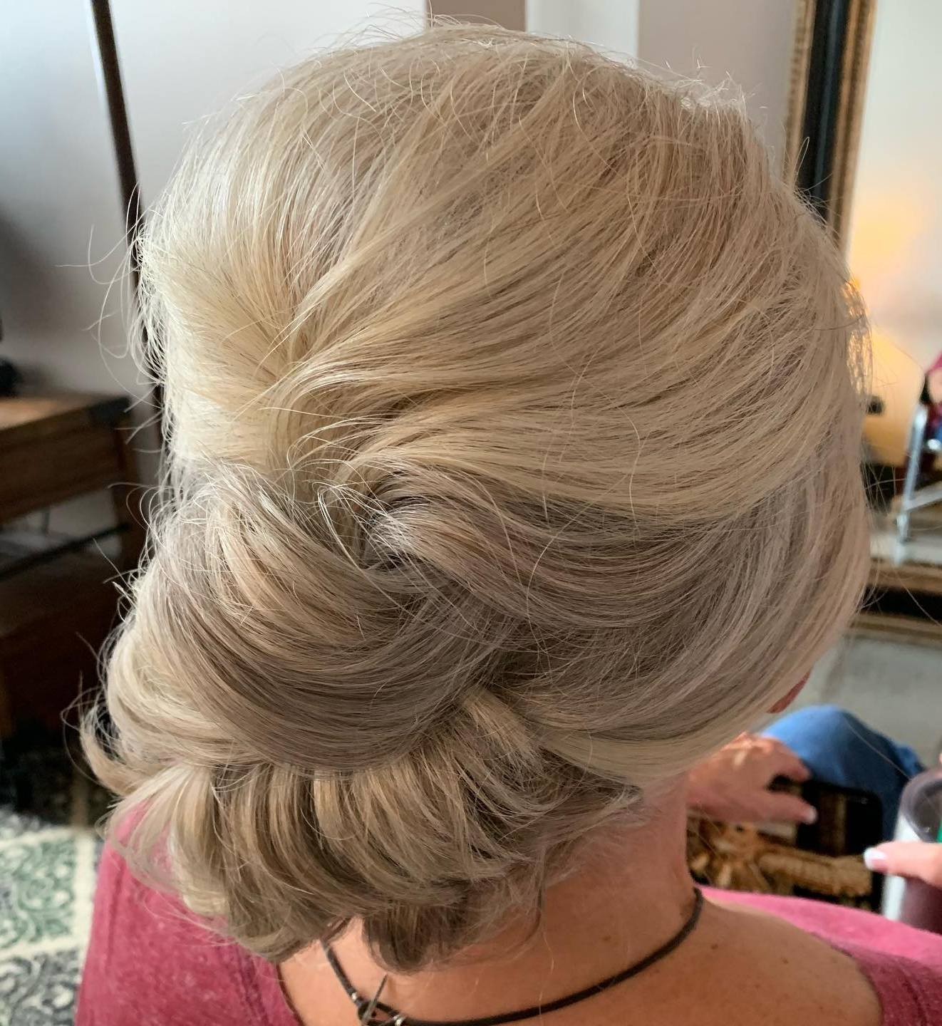 Voluminous Blonde Updo with Bouffant